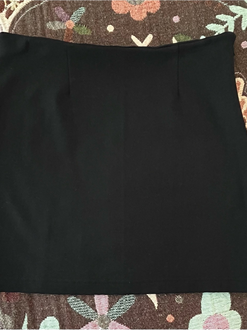 Women's Black Mini Skirt - Sleek Everyday Style fits more like a small size